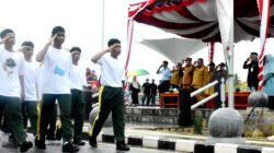Meski Diguyur Hujan, Warga Antusias Saksikan Lomba Gerak Jalan di Beltim
