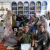 Peserta pelatihan UMK Bangka Belitung mengikuti sesi belajar Meta Ads yang diselenggarakan PLN Peduli di Hub UMK, dengan narasumber menjelaskan strategi pemasaran digital di depan layar presentasi.